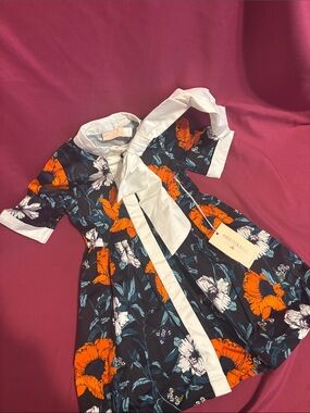 Girls' Navy Floral Dress with White Bow Trim